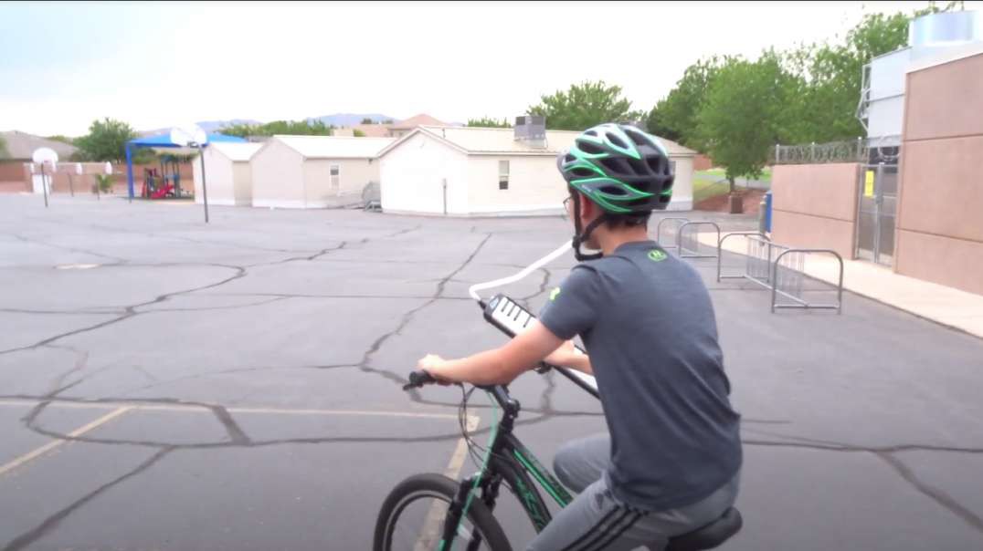 The Soviet Anthem, On A Melodica, Played With One Hand, Whilst Biking With the Other